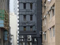 Bamboo scaffolding on left